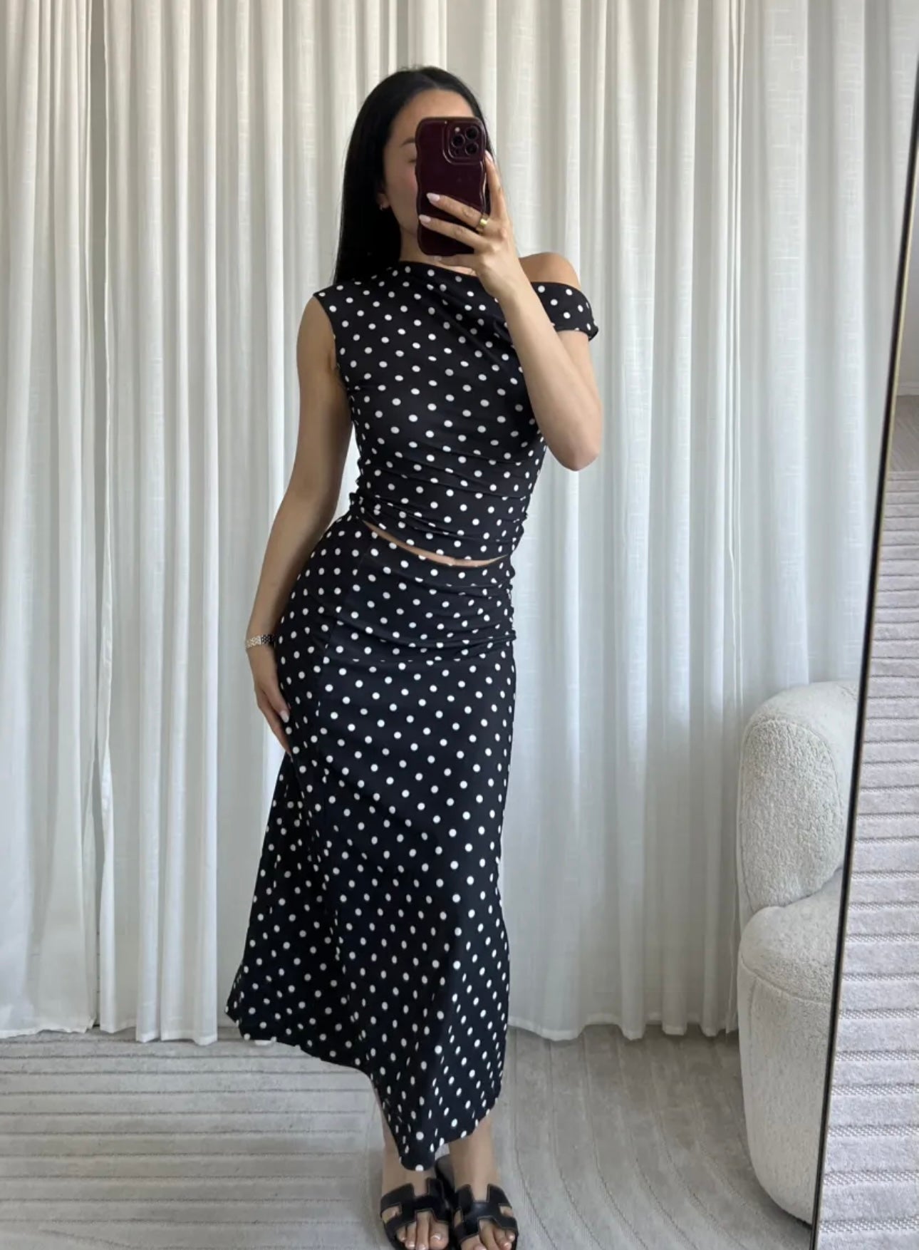Top asymétrique noir à pois