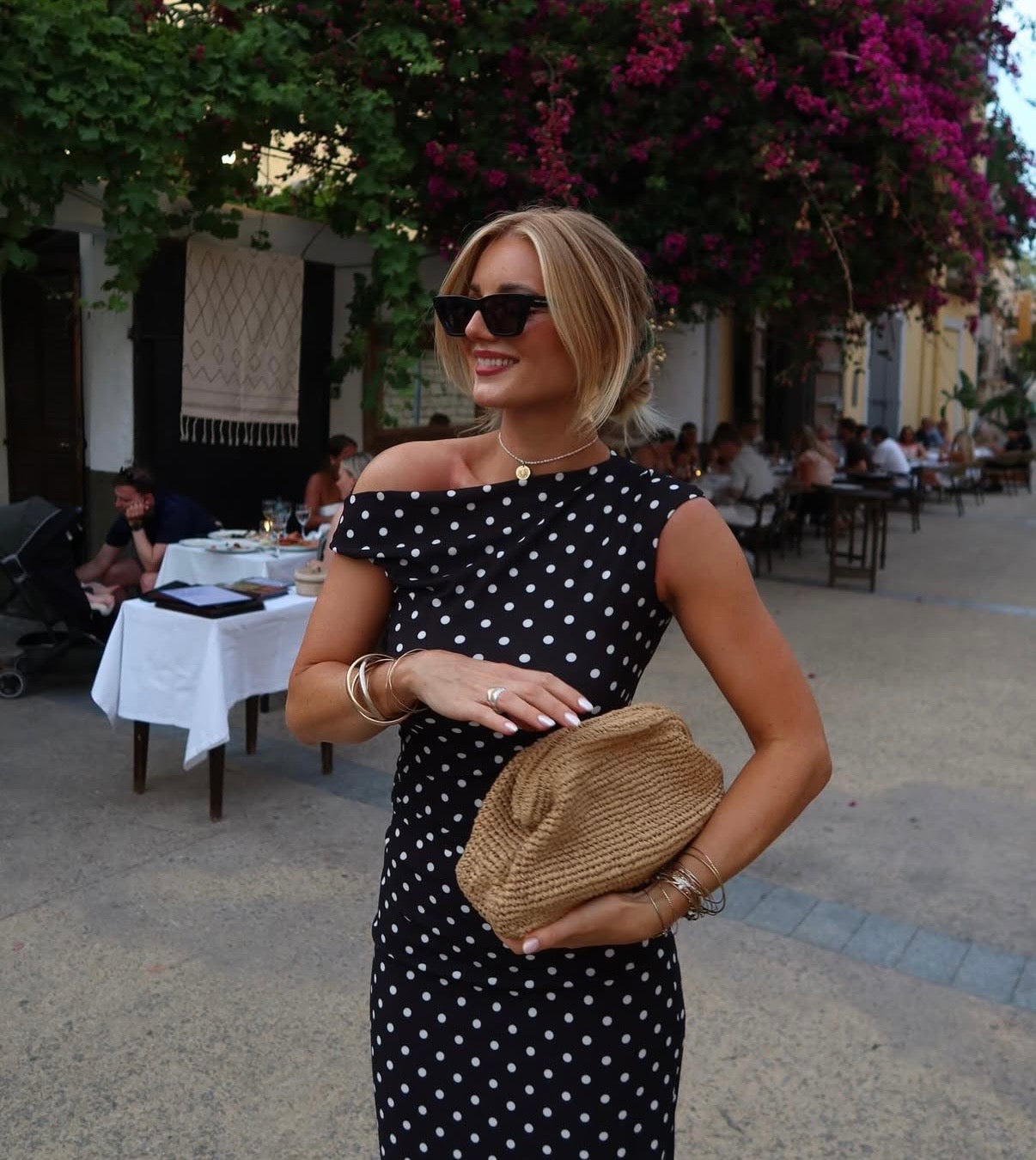 Top asymétrique noir à pois